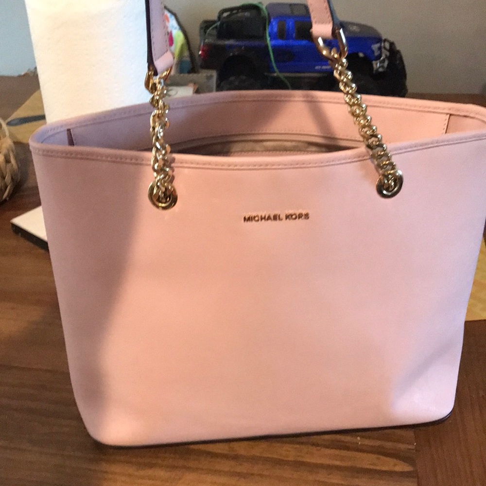 Rose colored Michael Kors bag